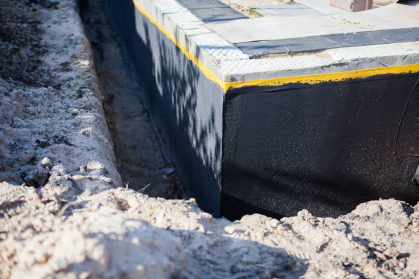 Professional Waterproofing technician working in Jessup, MD